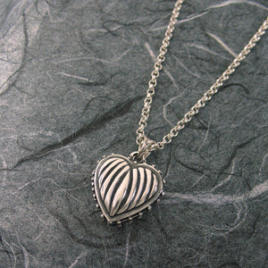 Small Ribbed Heart 2 Pictures
 Locket Sterling Silver