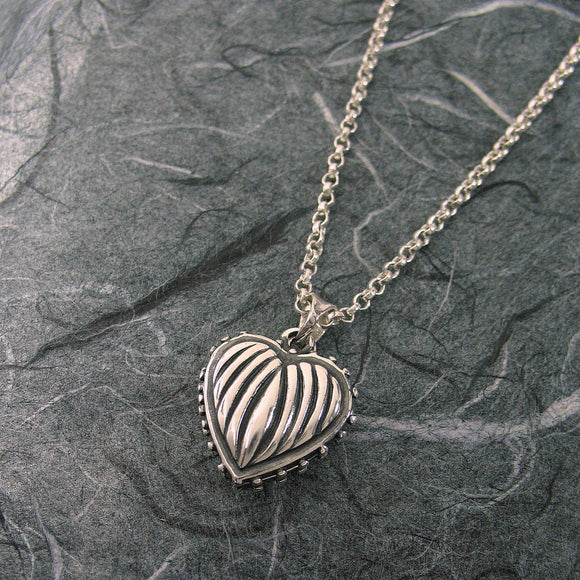 Small Ribbed Heart 2 Pictures
 Locket Sterling Silver