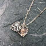 Small Ribbed Heart 2 Pictures
 Locket Sterling Silver